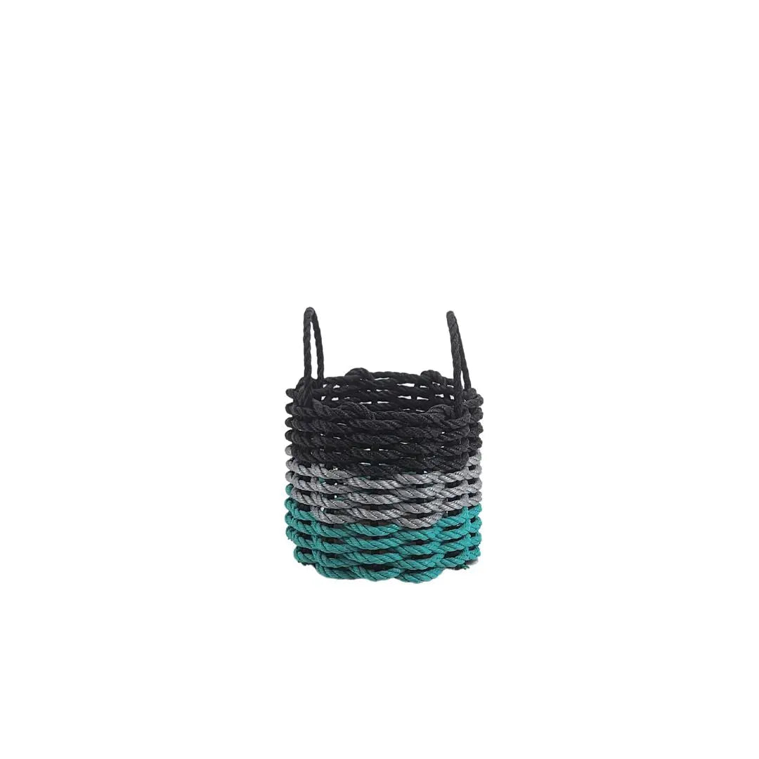 Handmade storage basket woven from Maine lobster rope in teal, gray, and black colors