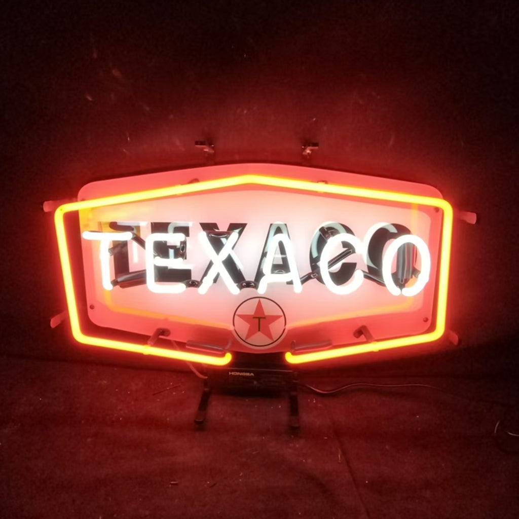 Texaco Gasoline Neon Light Sign showing glowing red and white neon tubes mounted on metal grid backing with metal chain hanging.