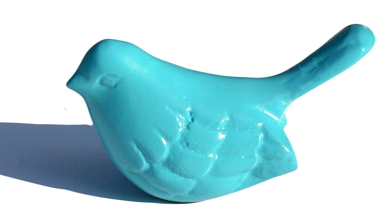 Turquoise aluminum bird figurine from Vibhsa displayed on tabletop