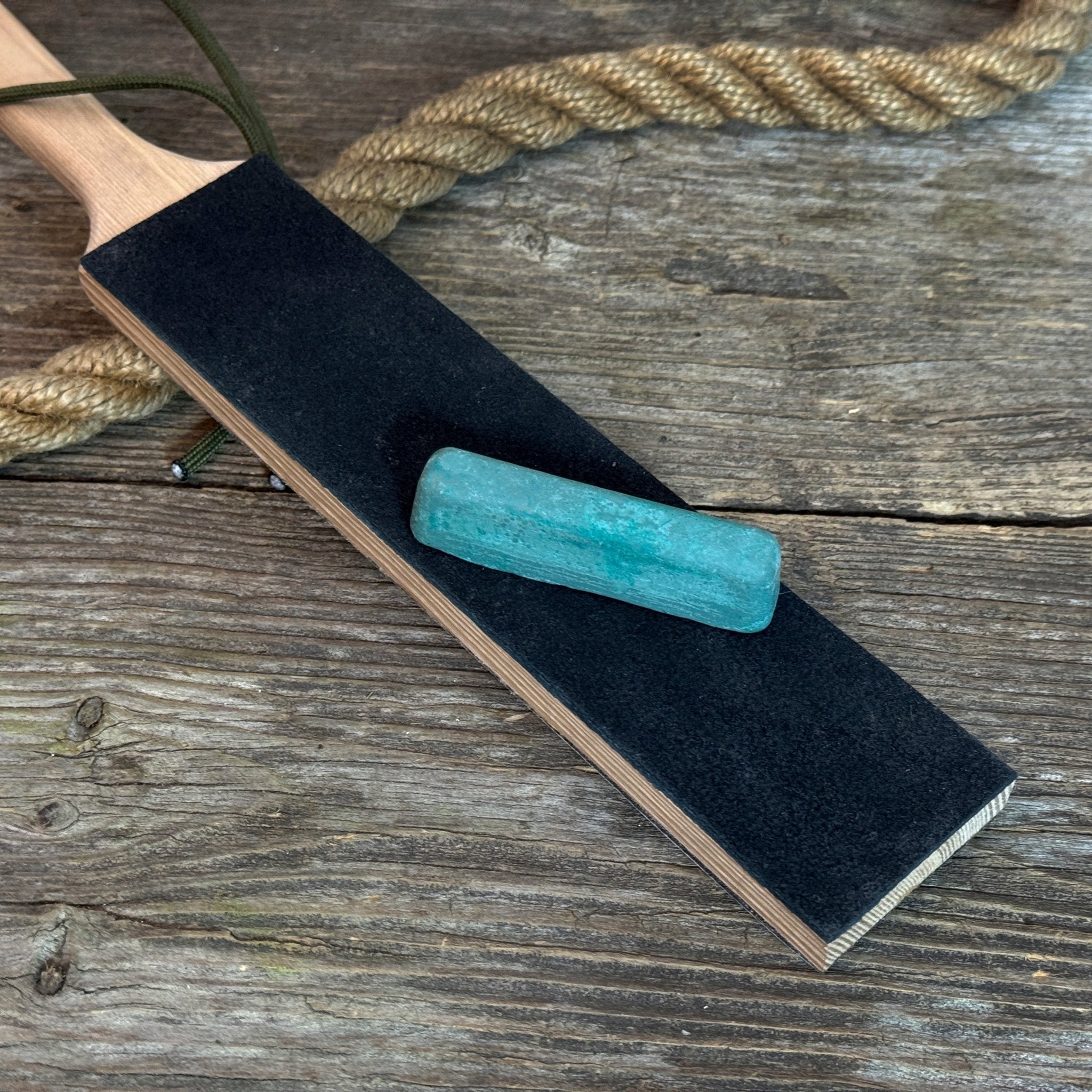 Universal Sharpening Kit including sharpening stones, leather strop, polishing compound, and wooden stand