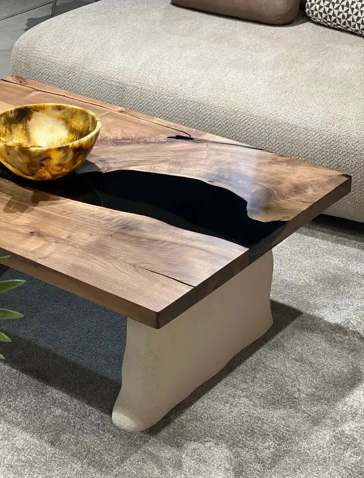 Handcrafted epoxy resin walnut coffee table with stone-inspired wooden legs