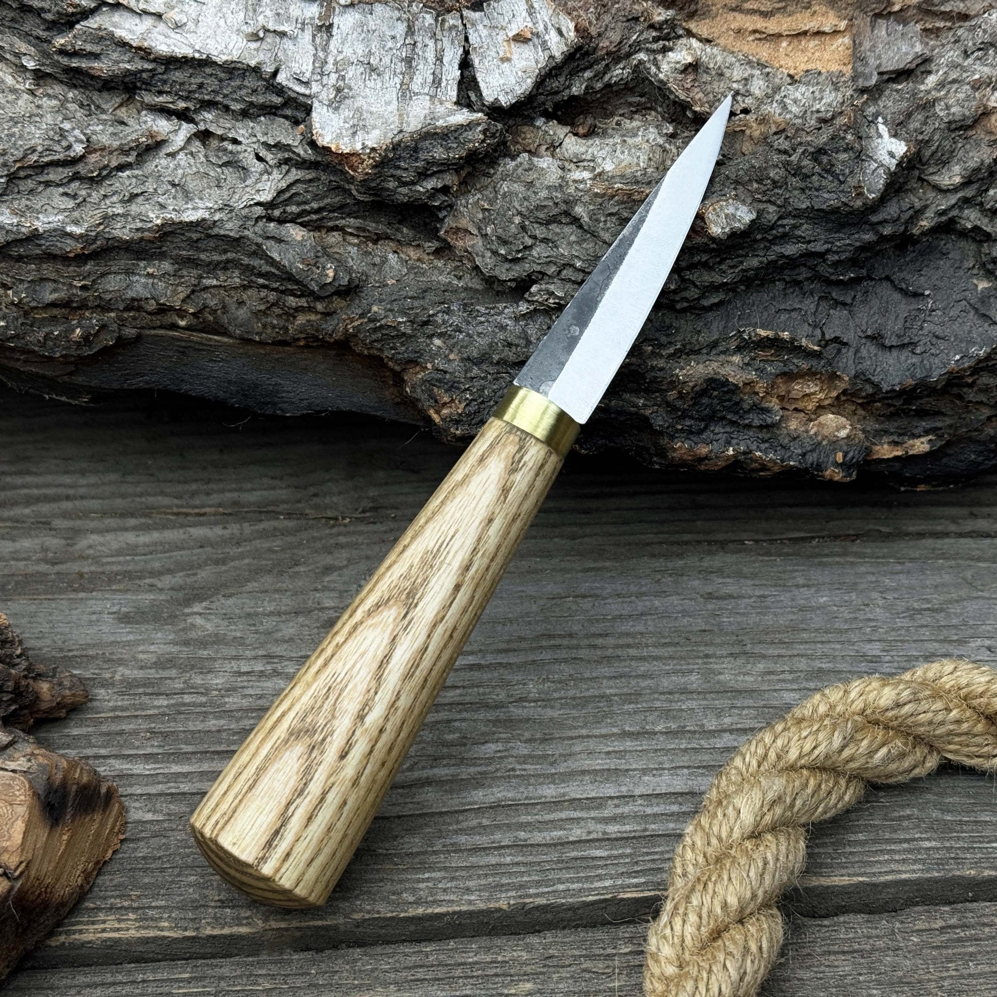 Hand-forged whittling sloyd knife with leather sheath and ash wood handle