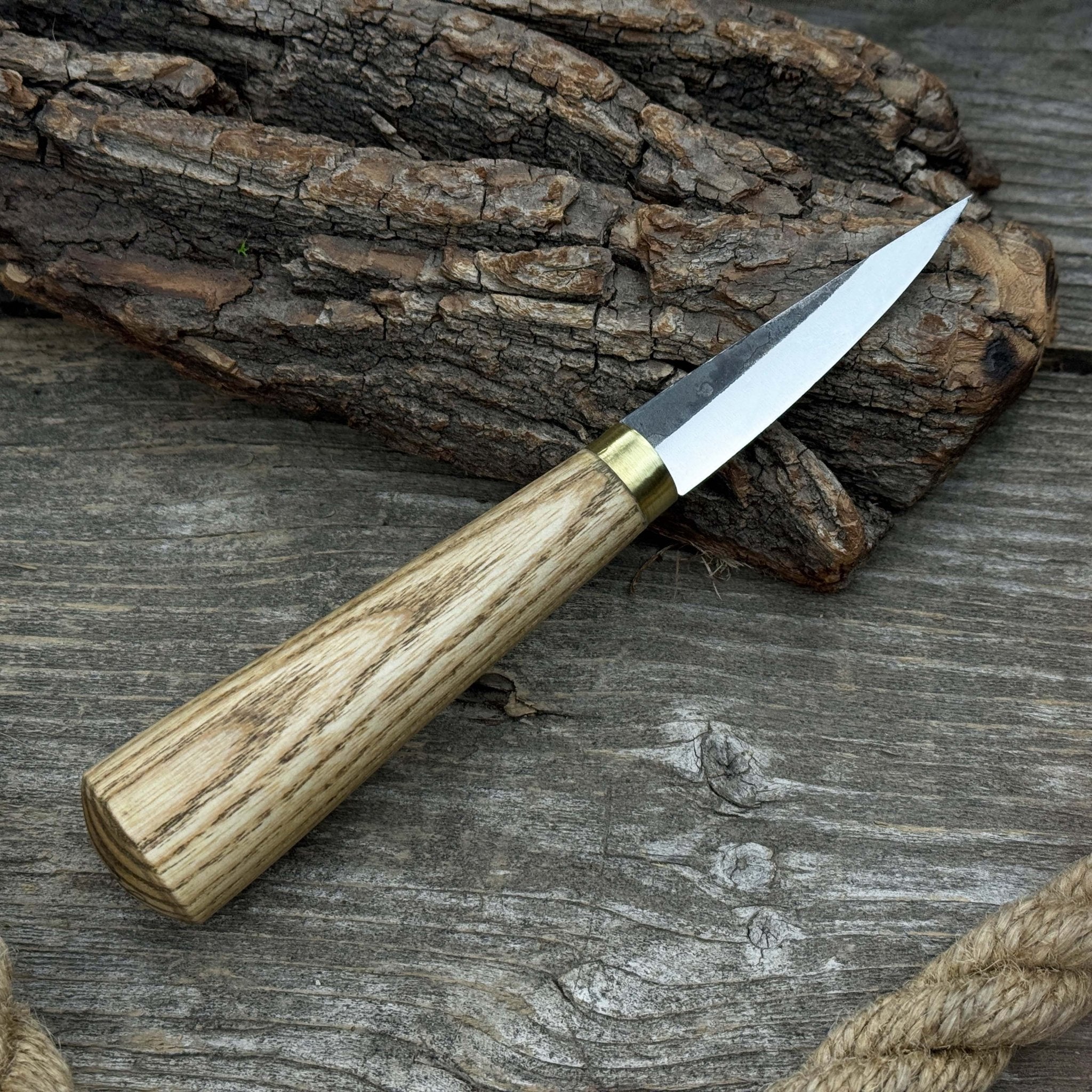 Hand-forged whittling sloyd knife with leather sheath and ash wood handle
