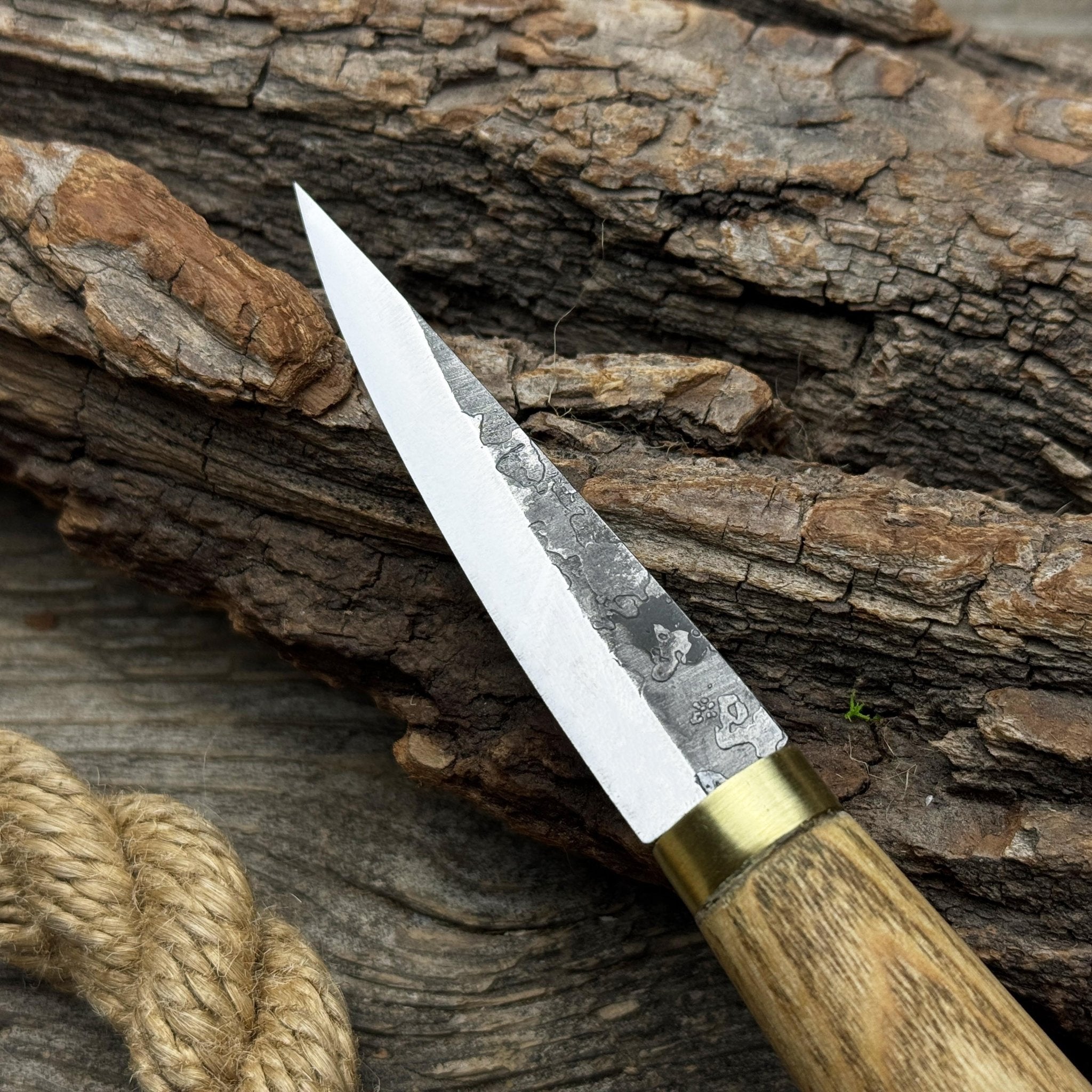 Hand-forged whittling sloyd knife with leather sheath and ash wood handle