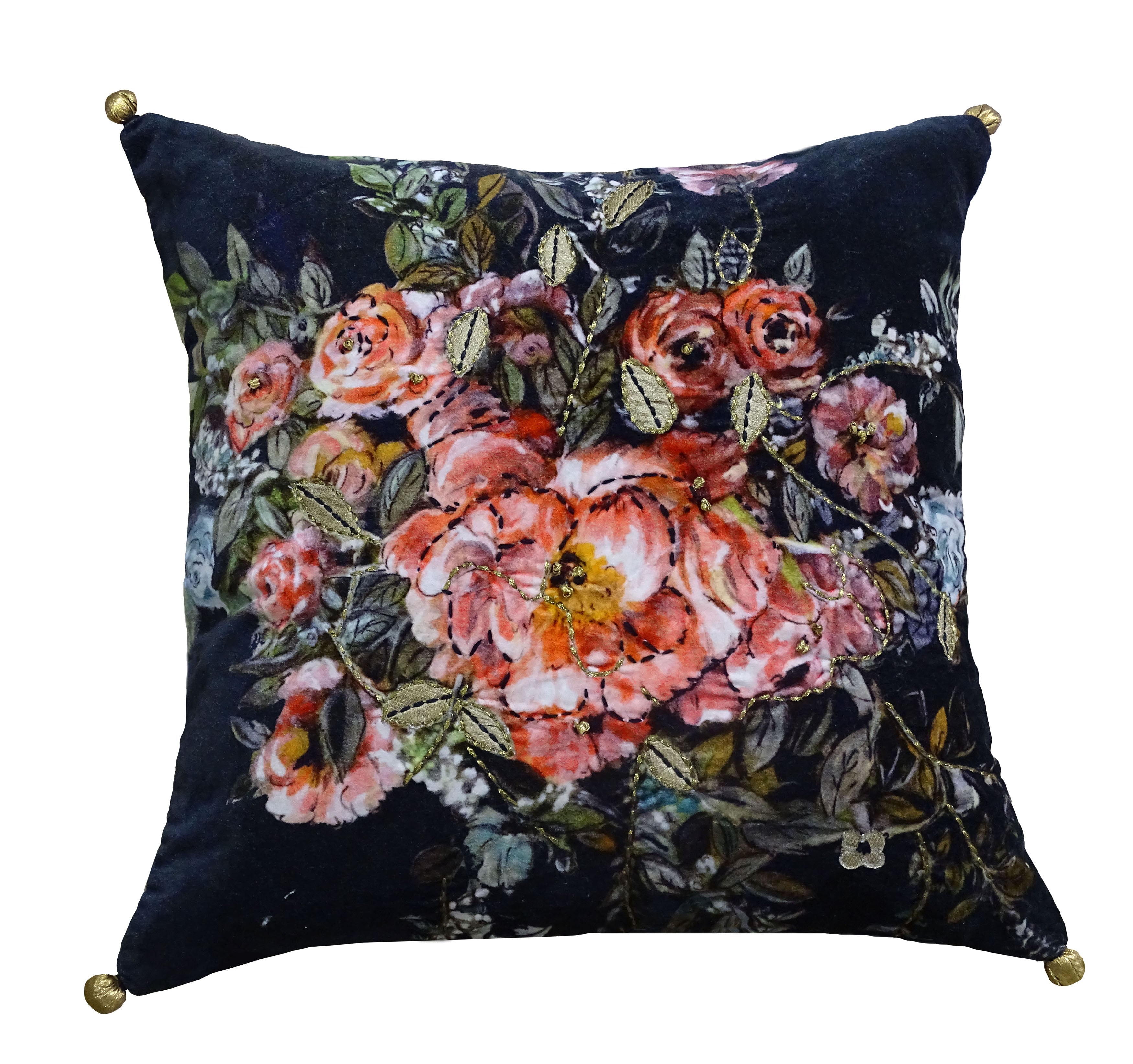 Black velvet throw pillow with subtle floral pattern, displayed on a textured fabric surface.