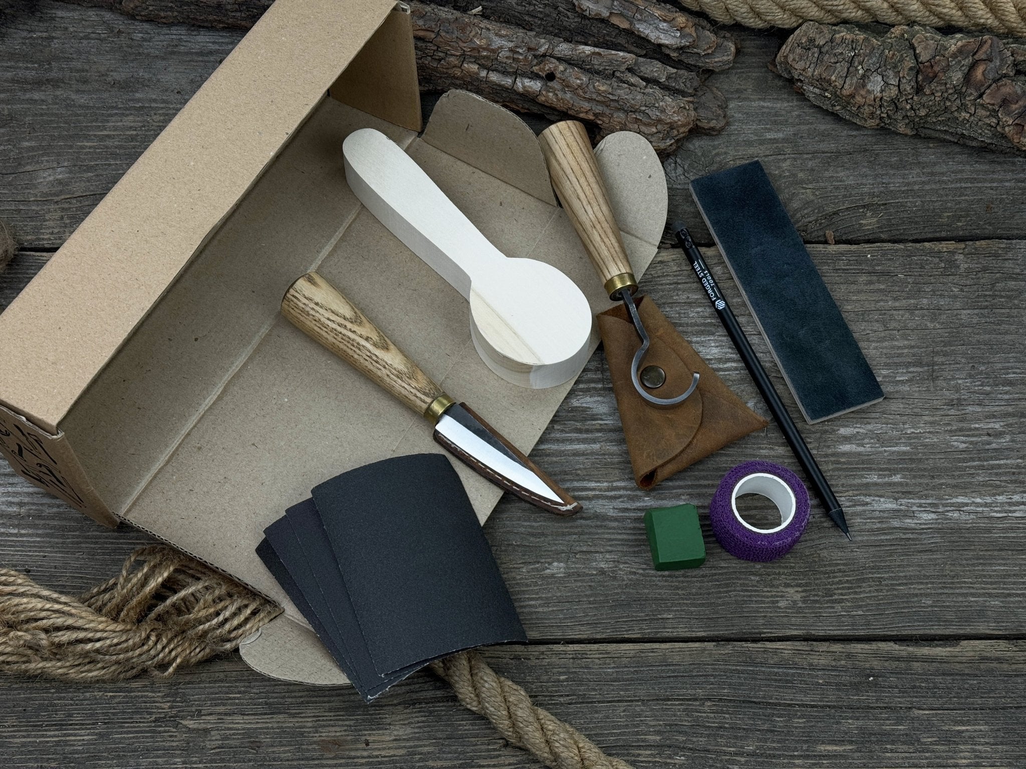 Wood Whittling Kit for Beginners Spoon Carving Edition with knives, wooden blank, sandpaper, and sharpening board