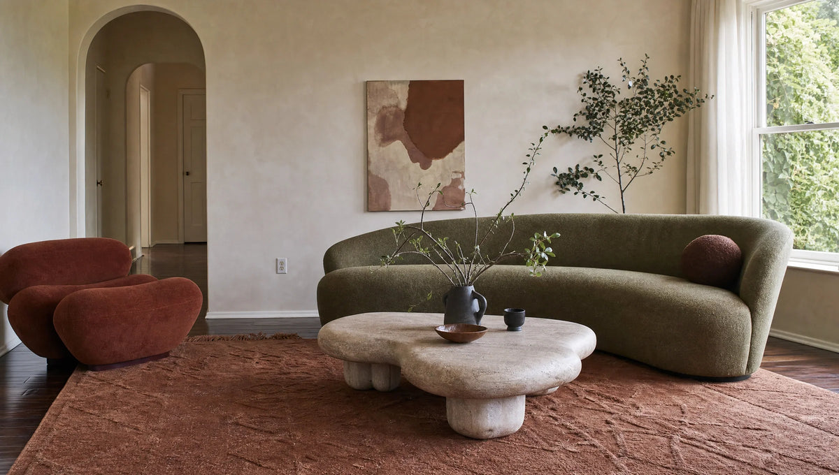 Organic outlines interrupt the straight lines of a contemporary room.
