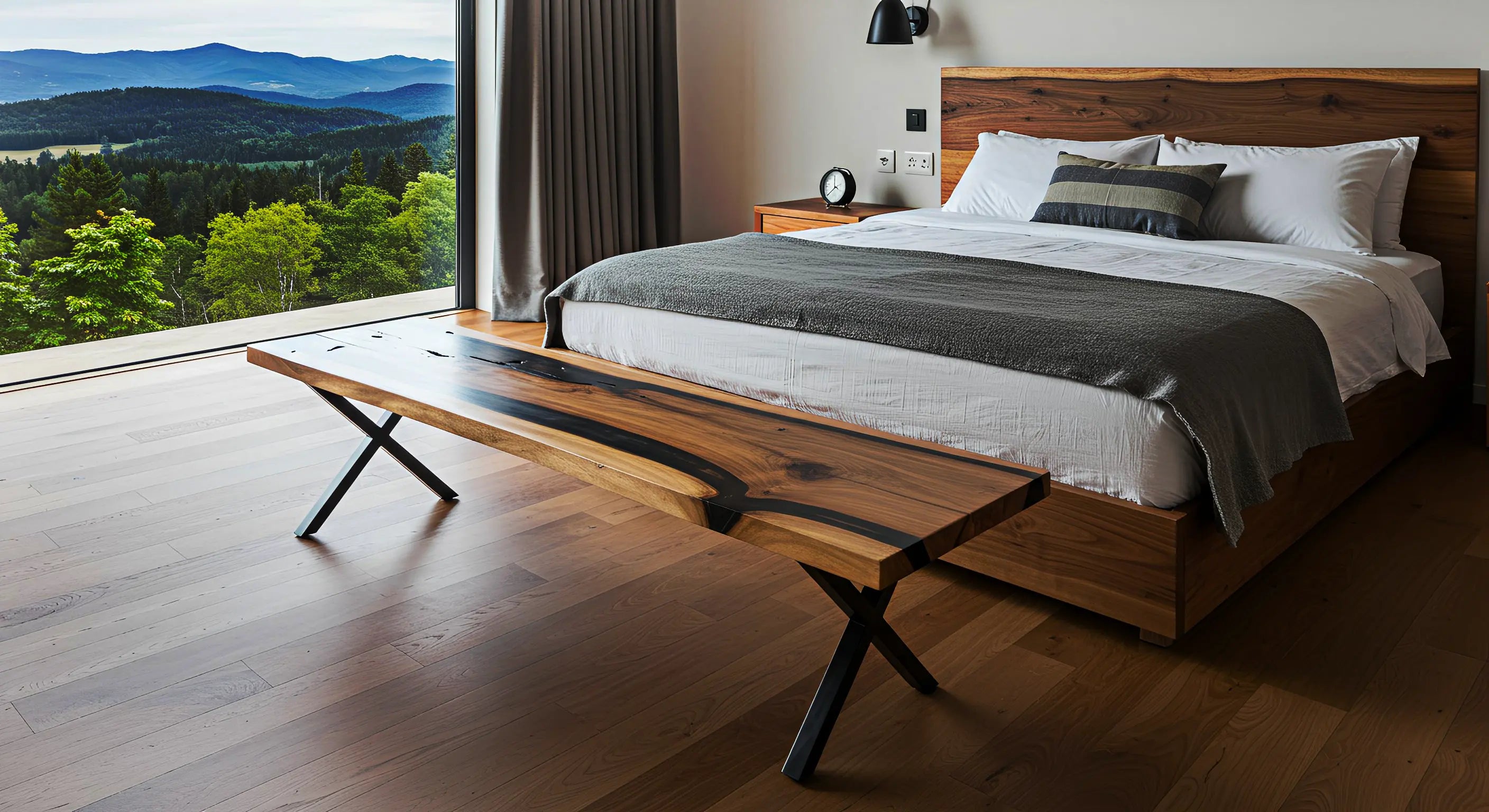 Epoxy Resin Bench inside a cabin bedroom setting with a scenic view. The epoxy bench is located at the end of a bed.