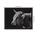 Black and white side profile of a Scottish Highland cow with long shaggy fur and two prominent horns against a black background in a dark ornate frame.