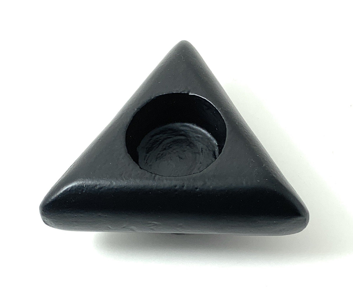 Black triangular candle holder with rounded corners and a circular cavity at the center, shown from above on a white background.