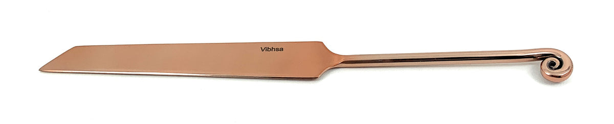 Copper-finished cake knife with a narrow, straight blade and a handle ending in a decorative spiral curl, shown on a white background.