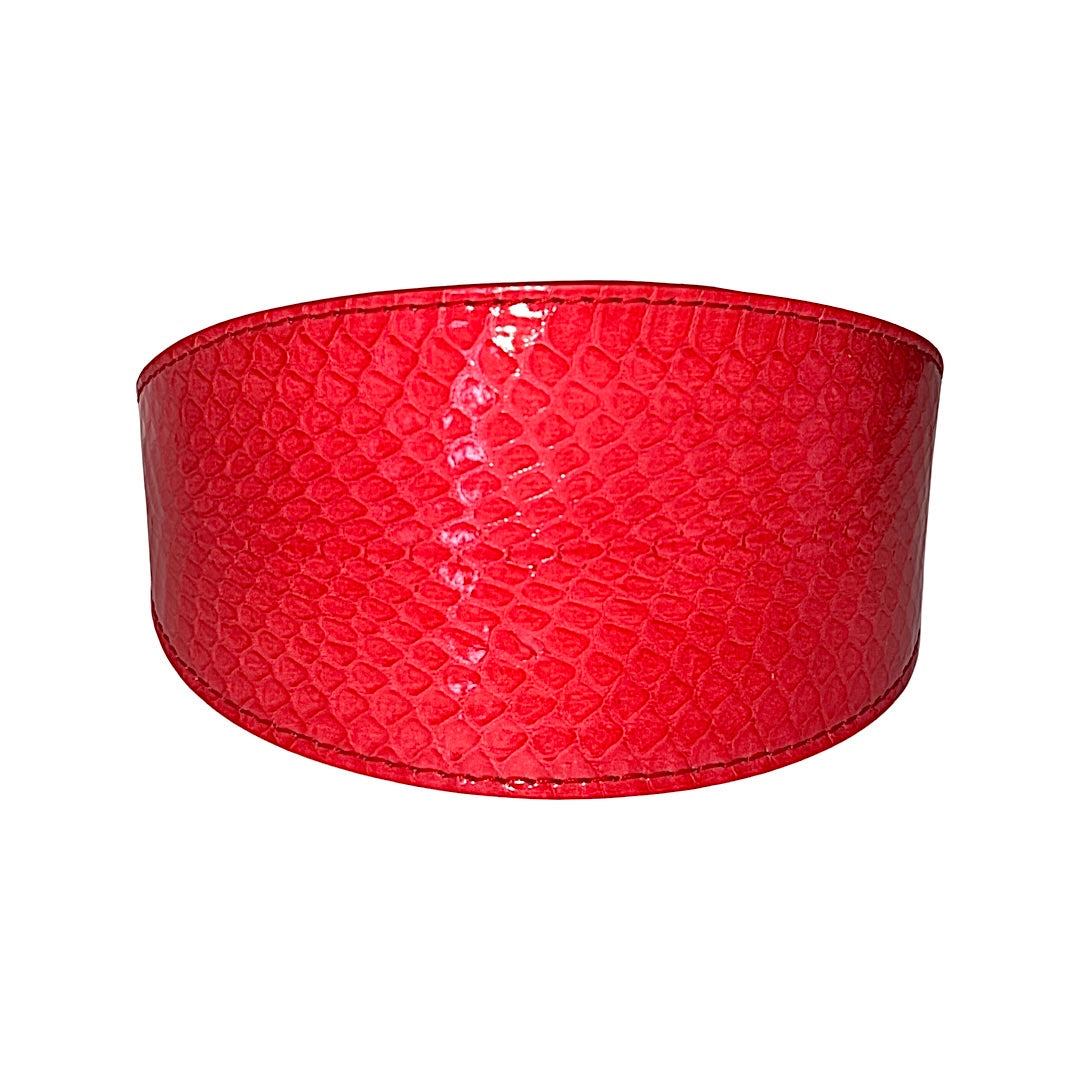 Red and orange snake pattern wide collar displayed on neutral background