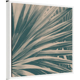 Sylvie Modern Retro Teal Maximalist Palm Leaves framed canvas art showing abstract overlapping palm leaves in teal and green hues