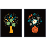 Two framed canvas art pieces with black backgrounds, each featuring a stylized floral arrangement: left with yellow vase, green leaves, and small flowers; right with orange vase and white, orange blooms.