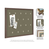Rectangular pinboard with olive green fabric featuring a subtle white botanical print and a dark brown wooden frame, holding two vintage black-and-white photos pinned by wooden clips.