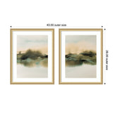 Two framed abstract landscape prints with soft green, beige, and blue tones resembling tranquil meadows and water reflections, each measuring 43 by 26 inches.