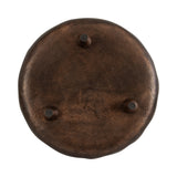Round dark brown resin tray with an irregular edge and three small cylindrical feet on the bottom side, shown from below.