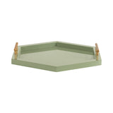 Hexagon-shaped decorative tray in muted green with gold and wood-tone cylindrical handles on opposite sides.