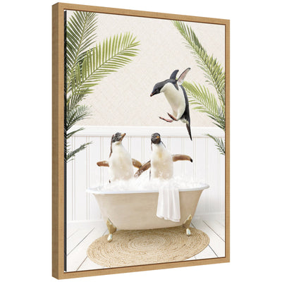 Framed canvas art showing penguins relaxing in a palm bathtub, by Amy Peterson