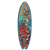 Surfboard-shaped wall art depicting vibrant underwater scene with colorful fish and red, orange, and green coral on a blue background.