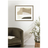 Framed abstract wall art with muted beige, white, and gray organic shapes hanging above a dark olive-green armchair with an open book, next to a tall potted plant with olives.