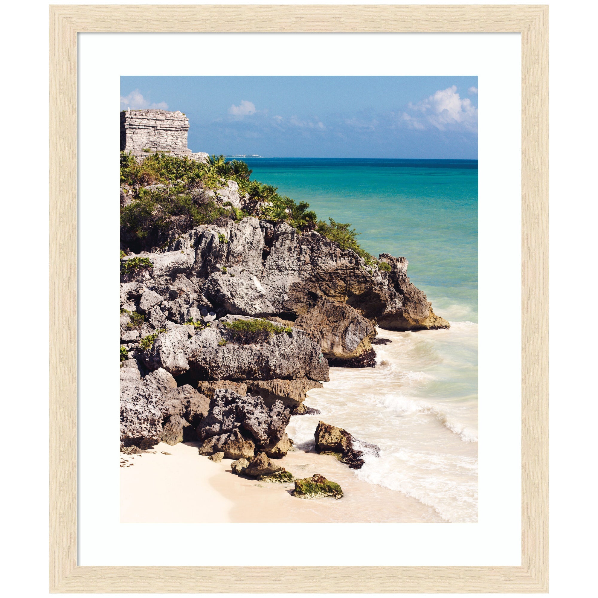 Framed art print depicting Tulum ruins on cliffs overlooking turquoise ocean with waves and sandy beach, by Stephanie Klatt