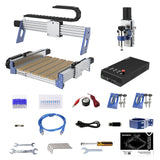 Desktop CNC router with aluminum frame and wooden bed, blue and black spindle motor, black control box, and various cables, wrenches, and assembly tools laid out separately