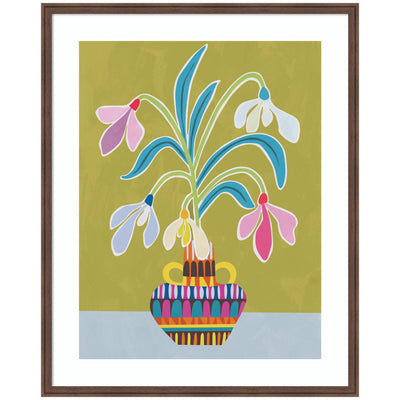 Framed abstract floral art featuring bold geometric snowdrop flowers in rich colors against a muted green background, set in a medium brown frame.