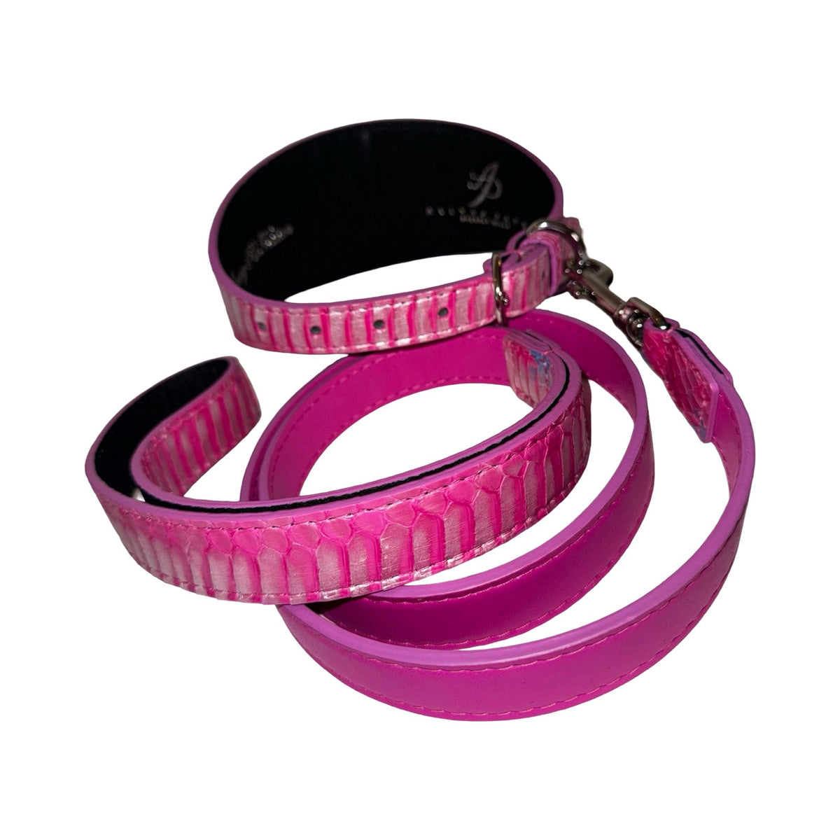 Bright pink collar and leash set with an iridescent snake pattern on the collar, featuring silver hardware and a smooth pink leash.