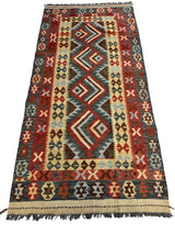 Afghani Maimana Kilim wide runner rug featuring geometric diamond patterns in red, blue, beige, and brown with multiple colorful borders and fringed edges.