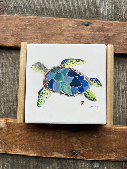 Sea Turtle Coaster set with detailed sea turtle design on a wood caddy holder, styled on a coastal-themed table