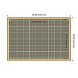 Rectangular sage green fabric pinboard with white plaid grid pattern and natural wood frame, labeled with 38x26 inch outer and 36x24 inch inner dimensions.