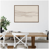 Minimalist abstract canvas art with soft beige and taupe horizontal brushstrokes framed in dark wood, hanging above a wooden dining table with white chairs and neutral cushions.