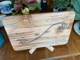 Ambrosia Maple charcuterie board with flower scroll resin inlay by Fitzgerald Custom Woodcraft