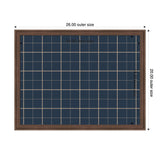Rectangular navy blue fabric pinboard with a beige plaid grid pattern, framed in medium brown wood, dimensions labeled as 26 by 20 inches outer size.