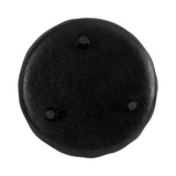 Bottom view of a round black decorative tray with three small round feet evenly spaced on the base surface.