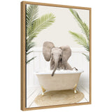 Sylvie Baby Elephant 3 in Palms Bathtub framed canvas art showing a baby elephant resting among palm-like leaves with soft green and gray tones.