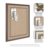 Rectangular beige canvas pinboard framed in dark wood with black scalloped border, holding two monochrome photos pinned diagonally near the top left corner.