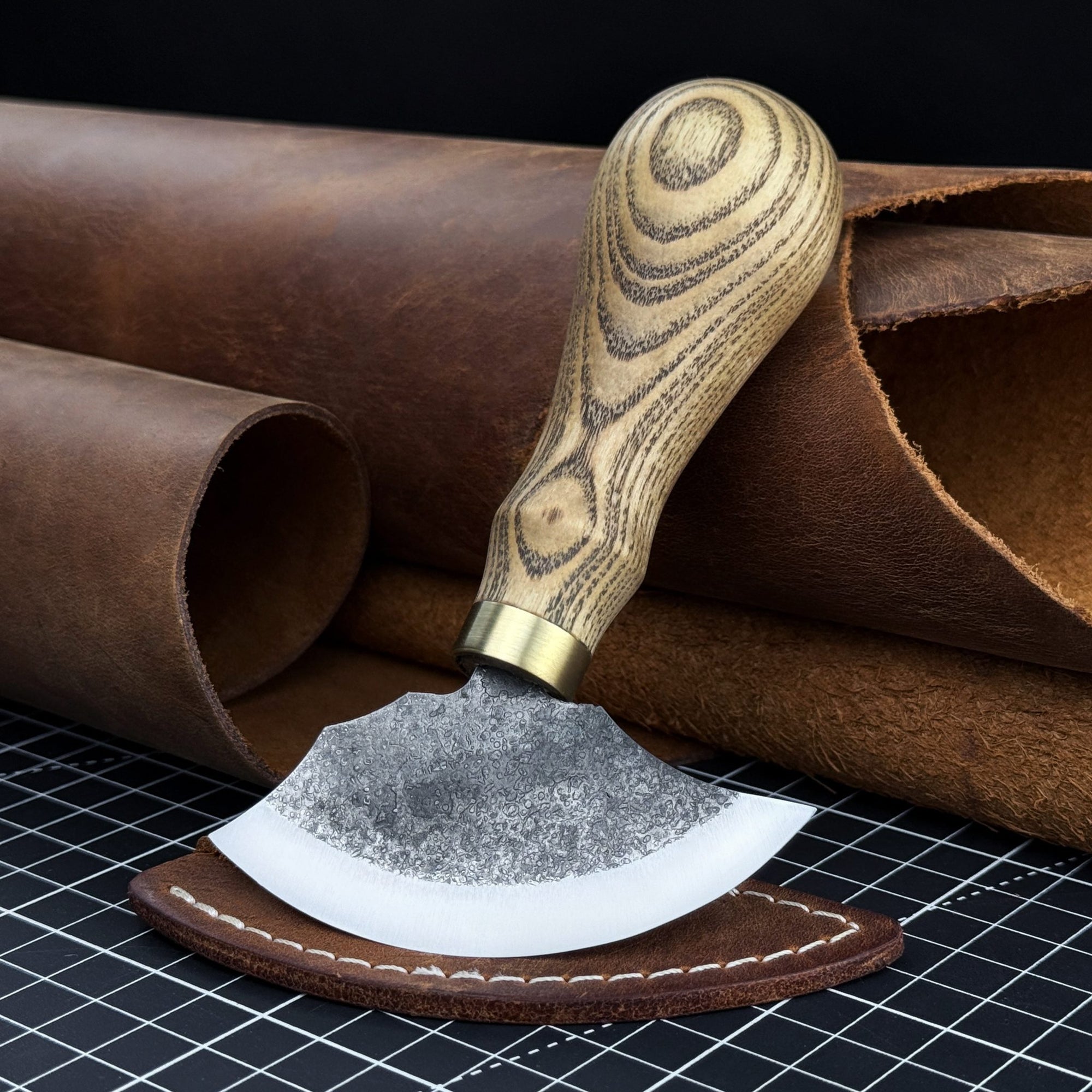 Small leather round knife with ash wood handle and high-carbon steel blade