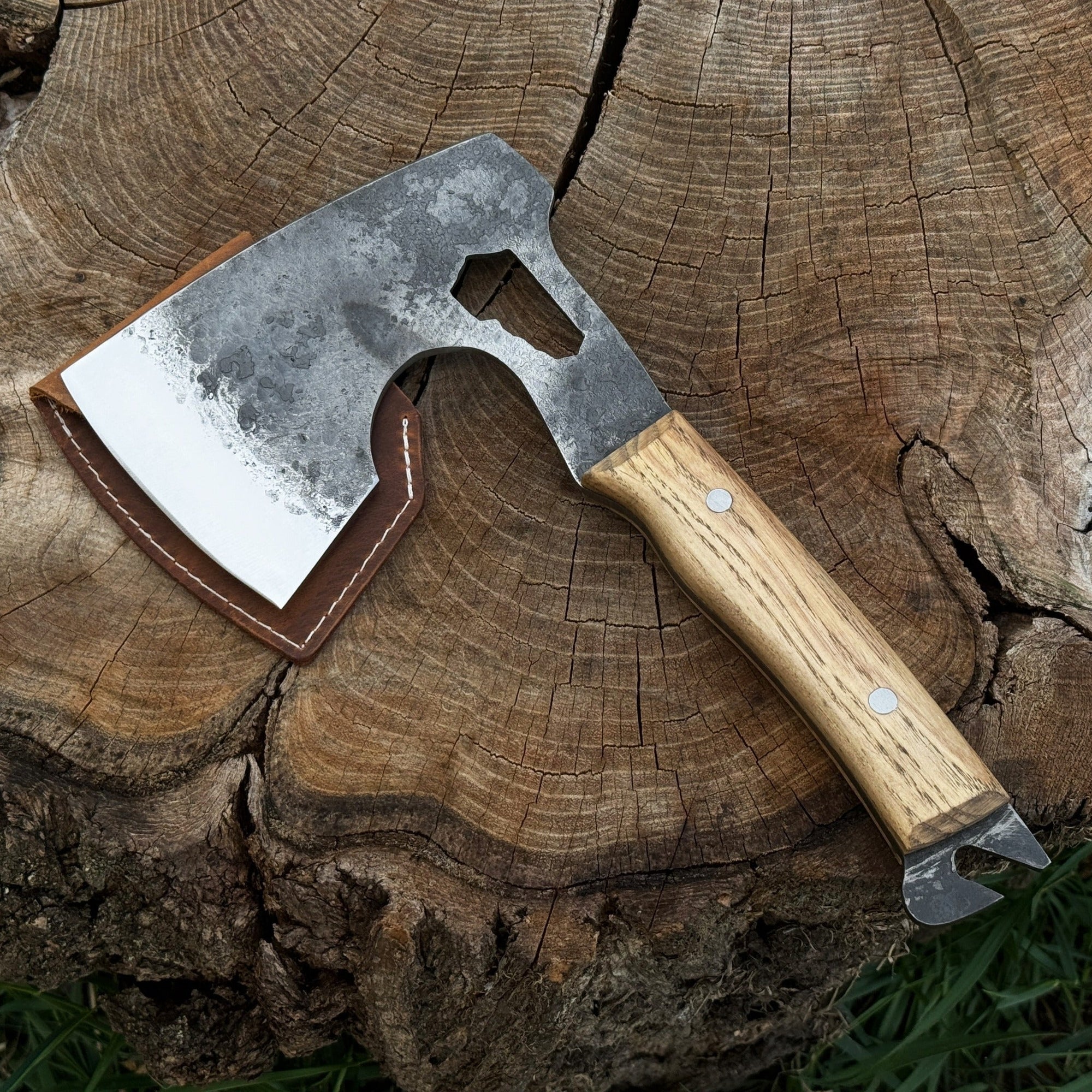 Hand-forged camping chopping axe with ash wood handle and leather sheath