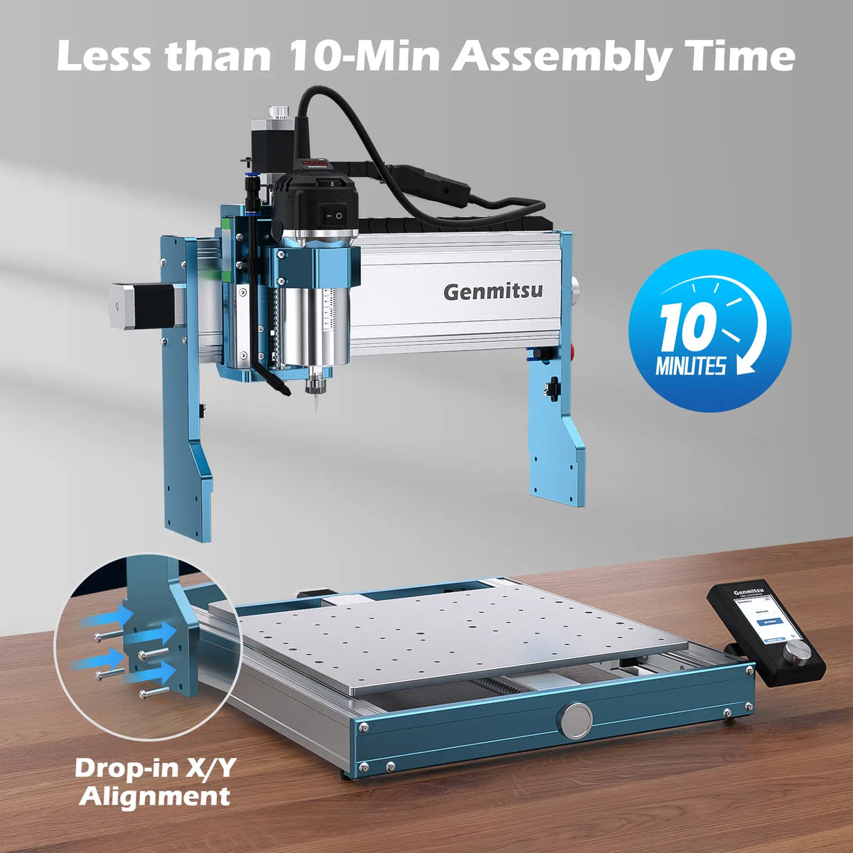 Blue and silver Genmitsu 3030-PROVer desktop CNC router with drop-in X/Y alignment slots and a touchscreen control on a wooden surface.
