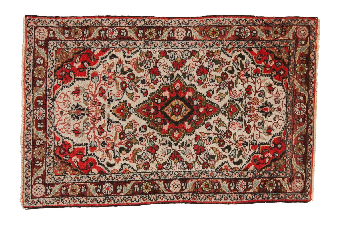 2.5x4 Vintage Dargezine Rug with shield-like medallion and colorful floral patterns