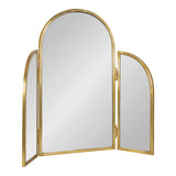 Tri-fold mirror with an arched top and three panels in a brushed gold metal frame, shown with the side panels angled outward.