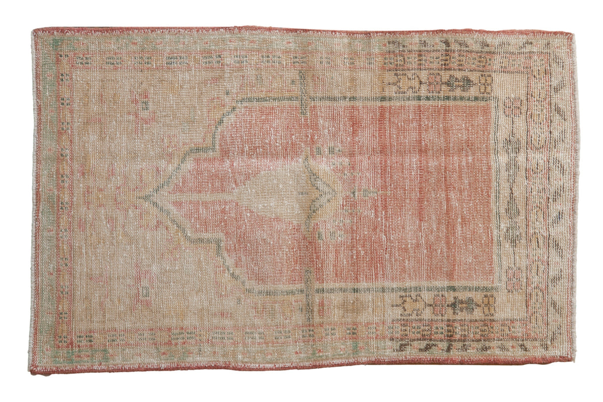 3x4.5 vintage distressed Oushak rug in dusty pink, green, and cream tones with prayer motif and multiple borders