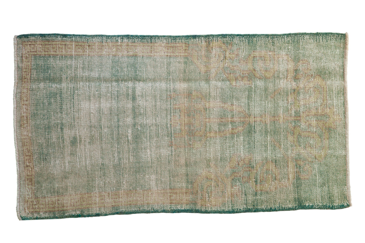 2.5x4.5 Vintage Distressed Oushak Rug showing prayer lantern motif in muted mint green and dusty mauve tones