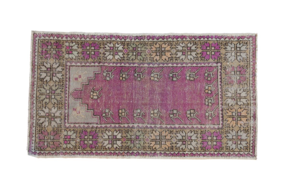 Vintage Distressed Oushak Rug Runner in muted purples, saffrons, and blues with intricate floral and geometric patterns