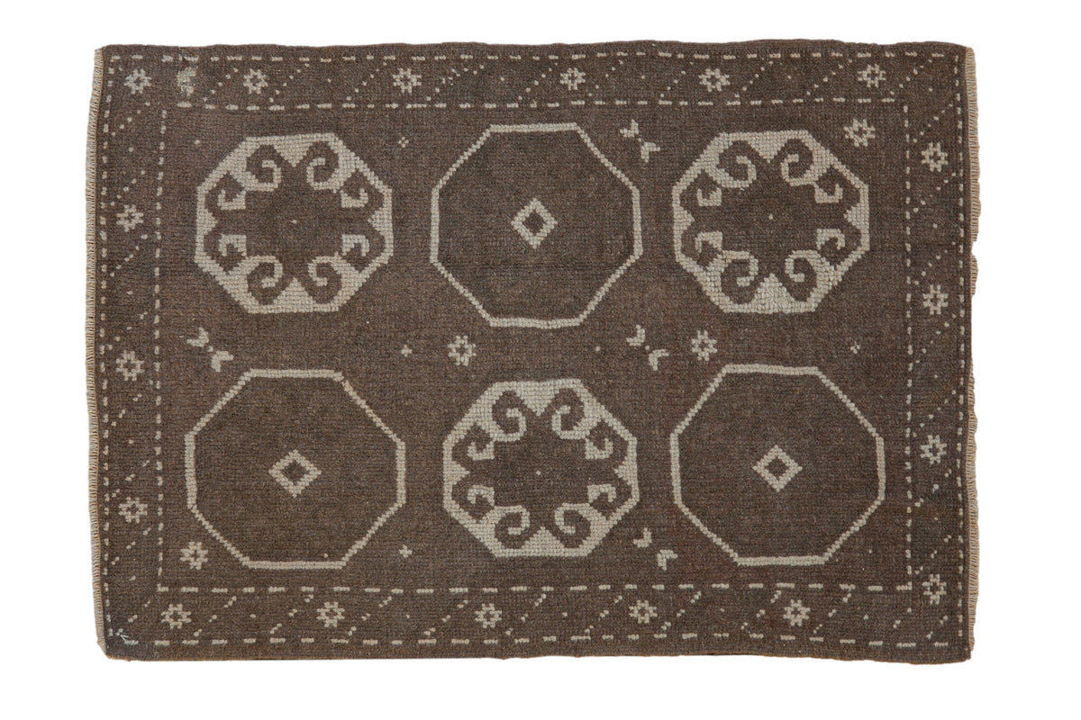 2.5x3.5 Vintage Distressed Oushak Rug showcasing geometric medallions and starburst border in chocolate brown, ivory, and charcoal tones.
