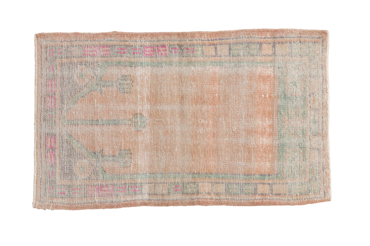 2x3 Vintage Distressed Oushak Rug Mat with prayer motif and geometric floral borders in soft apricot, mint green, magenta, beige, and cream