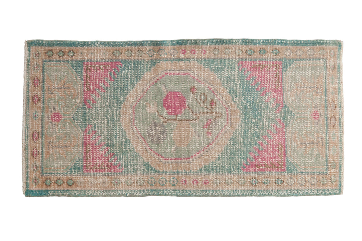 2x4.5 Vintage Distressed Oushak Rug Runner featuring a floral roundel medallion in ocean green blue and bubblegum pink tones