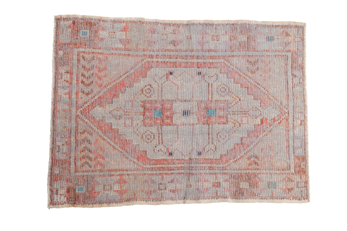 2.5x3.5 Vintage Distressed Oushak Rug with stepped diamond medallion and geometric floral patterns in muted tones